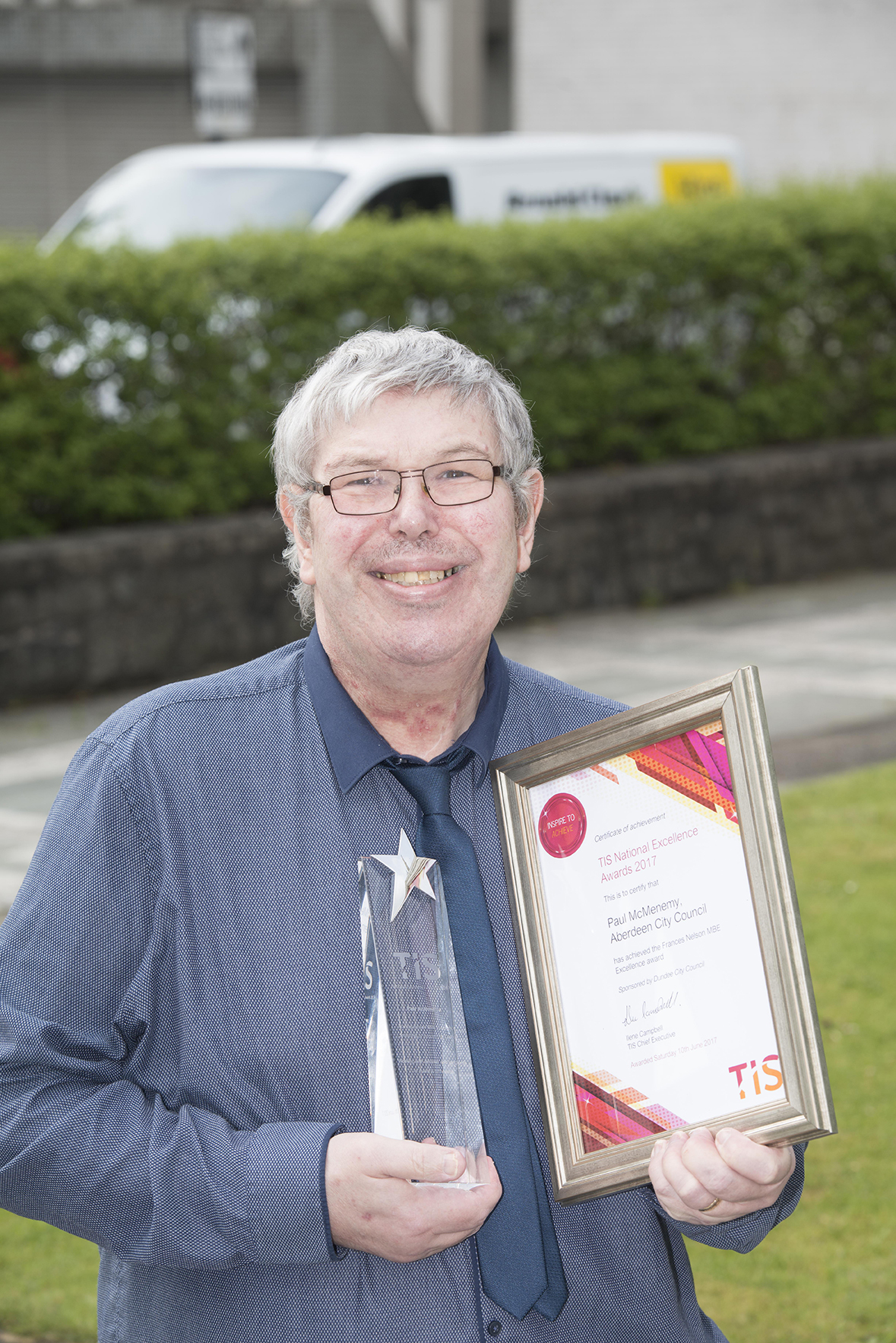 Photo of Paul McMenemy with his award